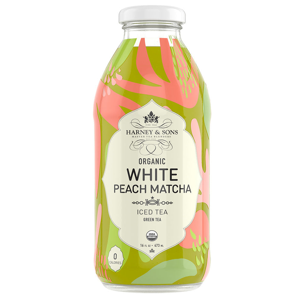 A bottle of Harney & Sons Organic White Peach Matcha Iced Tea, displaying a colorful label with peach and green hues.