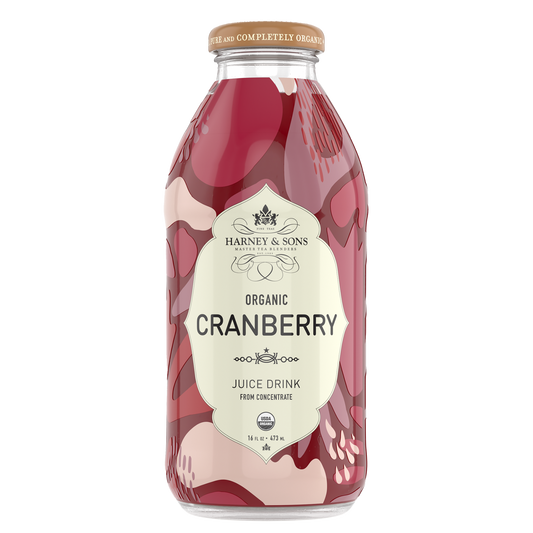 Bottle of Harney & Sons Organic Cranberry Juice Drink on a white background